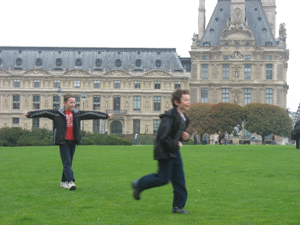 Children playing outside the Louvre, Paris
